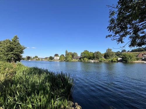 On the Thames Path looking across the water - so blue and enticing