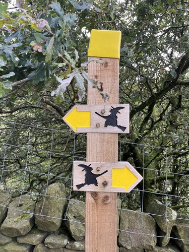 Pendle Way public footpath signs decorated with witches
