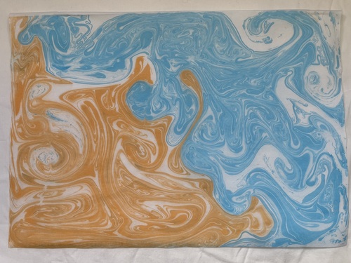 Attempt 1 of Suminagashi using blue and orange inks
