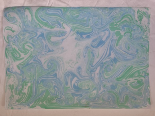 Attempt 2 of Suminagashi using blue and green inks