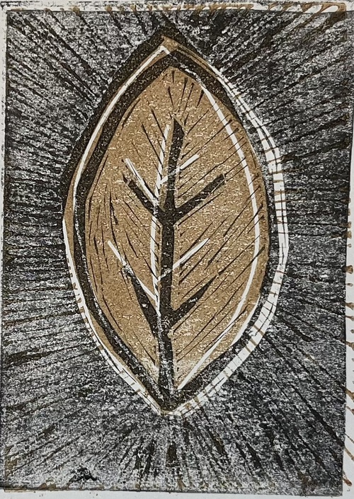 Final overprint of both blocks on one sheet, with a richer black ink and the brown/bronze ink