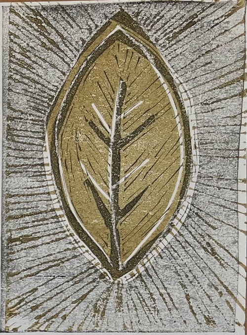 Test overprint of both blocks on one sheet, with a lighter black ink and the brown/bronze ink layered on top