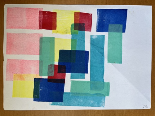 A white sheet of A4 covered in overlapping translucent rectangles of pink, red, yellow, blue and green ink