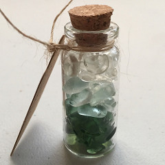 Tiny bottle of sea glass