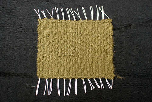 Off loom having lost a warp thread