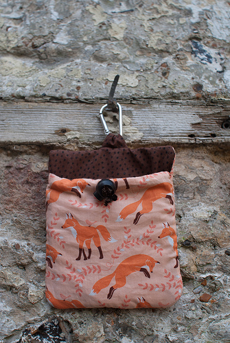 A hand sewn dog treat bag